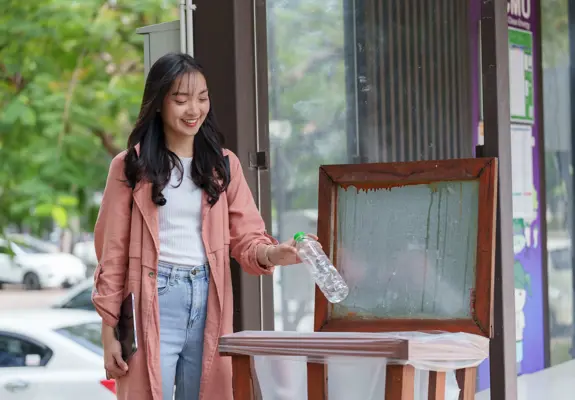 Girl Recycling Rubbish